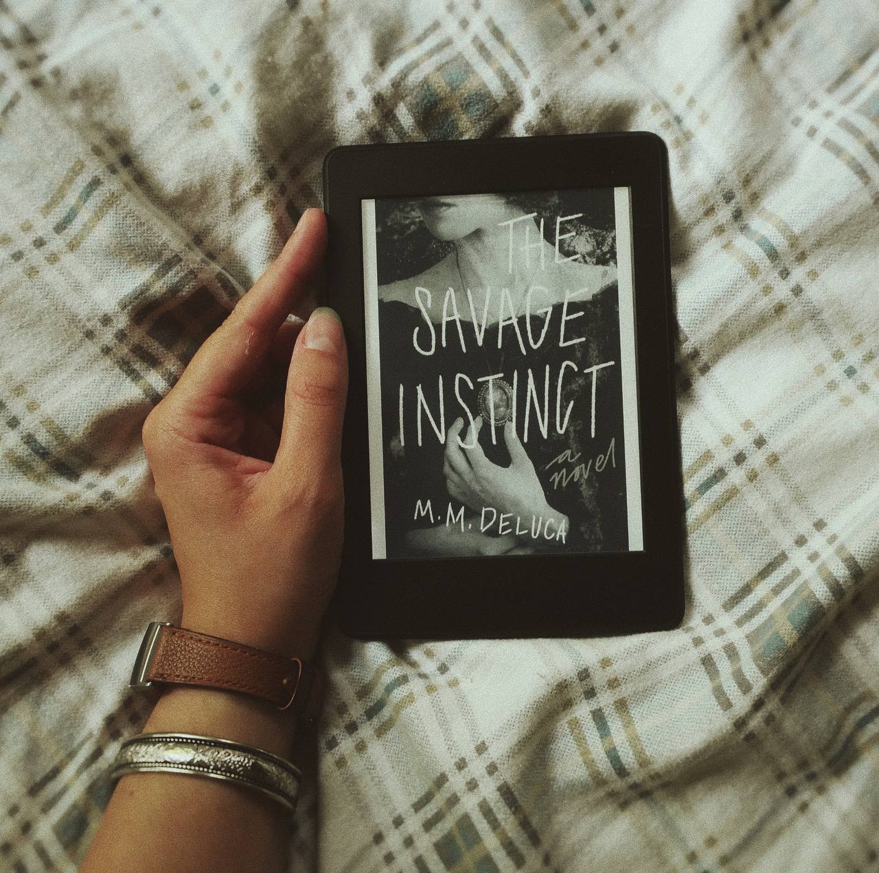 Cover on ebook the savage instinct by m.m. DeLuca marjorie deluca